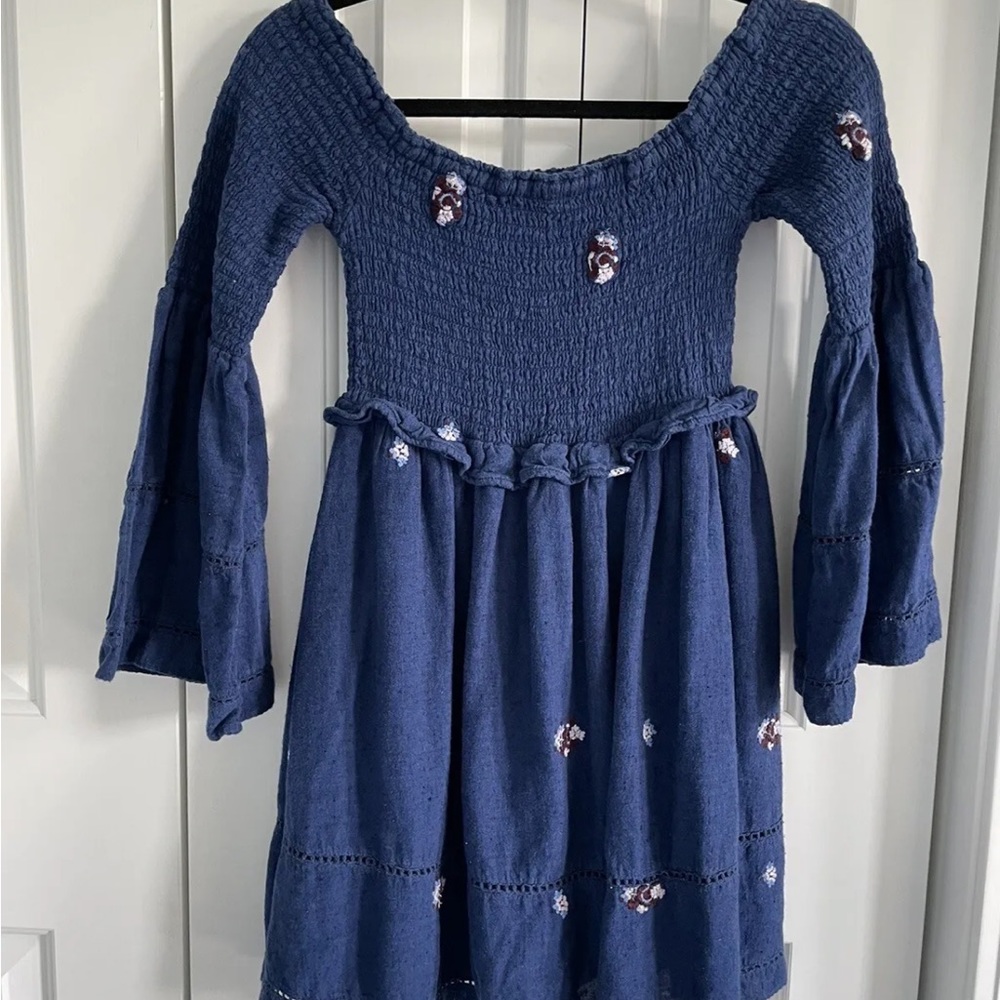 Free People COUNTING DAISES
Smocked Embroidered Off Shoulder Mini Dress